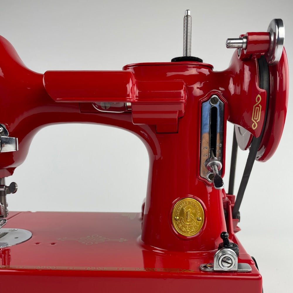 singer 221 Fetherweright red