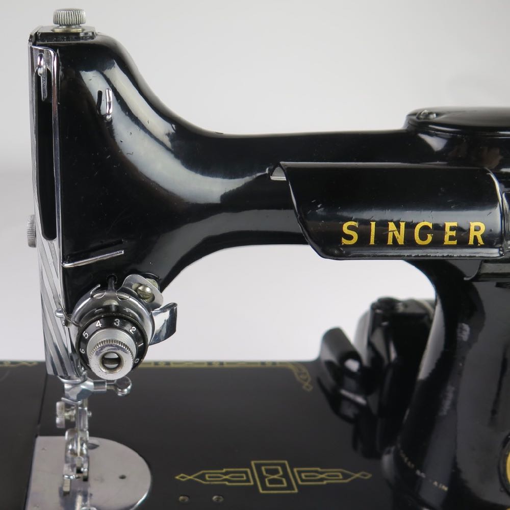 Singer 221