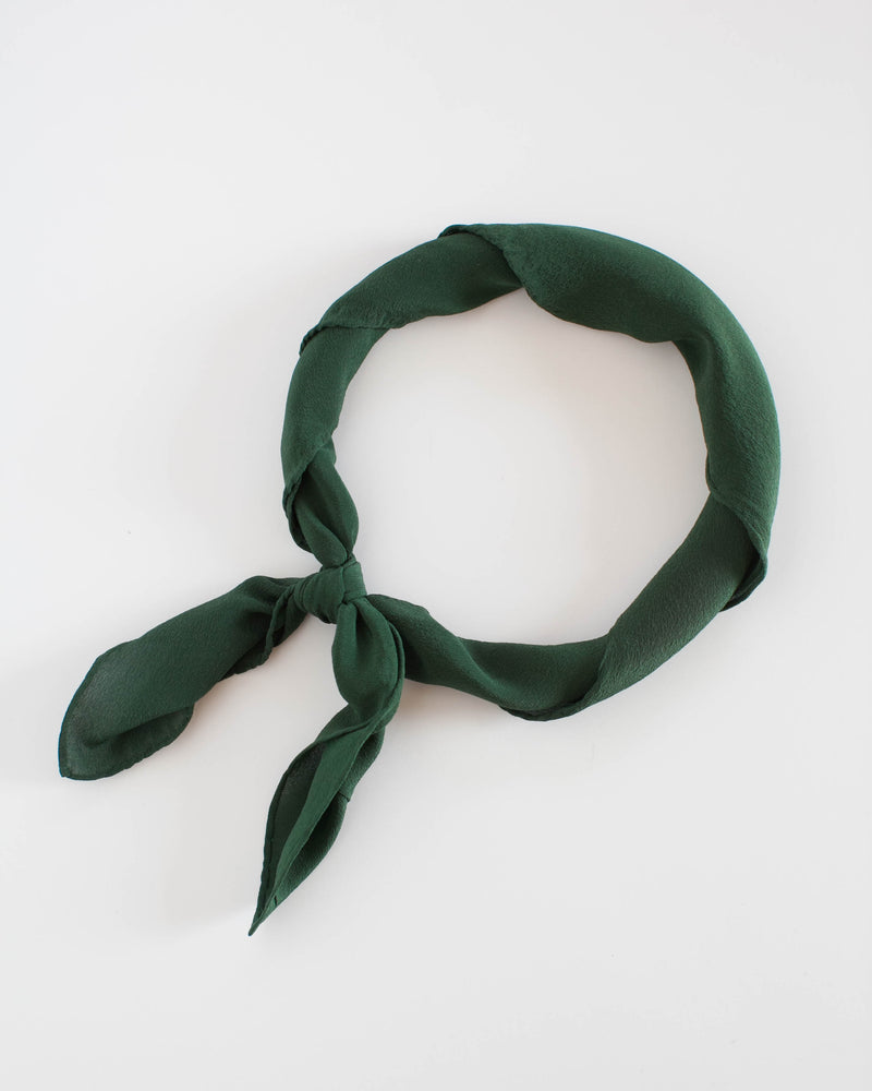Tono + co Silk Scout Scarf in Moss. Lovingly hand-dyed in Santa Ana, California and available in 24 signature colors. Check out our website for more style, color, and lookbook inspiration.