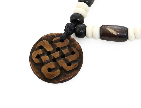 Tibetan Necklace | Relief Carved Endless Knot Pendant – Lhasa Artisan Brand