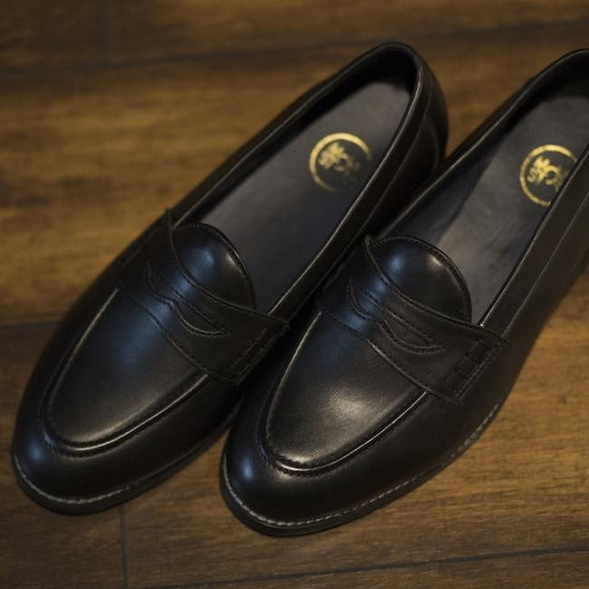 black penny loafers