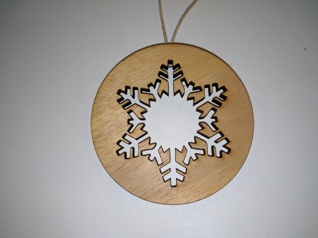 Cutout snowflake tree ornament