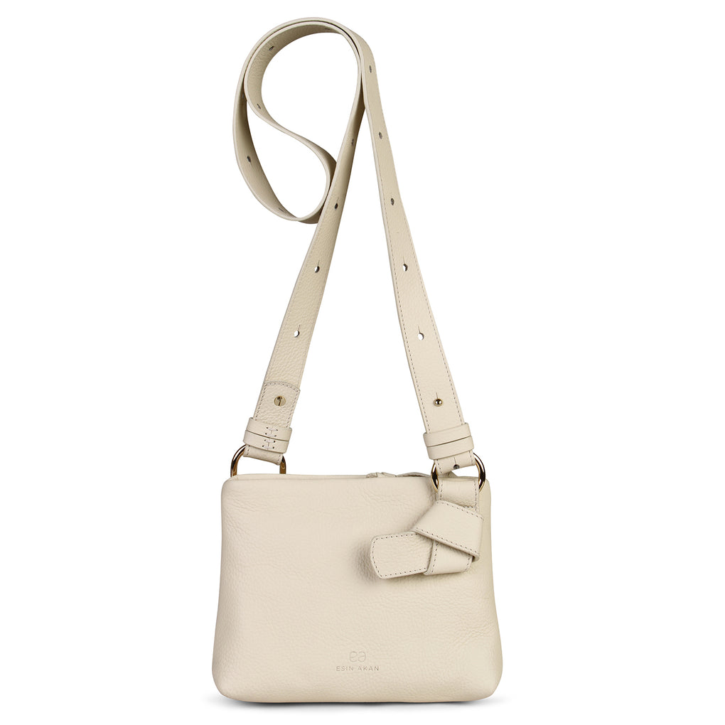 white designer clutch bag