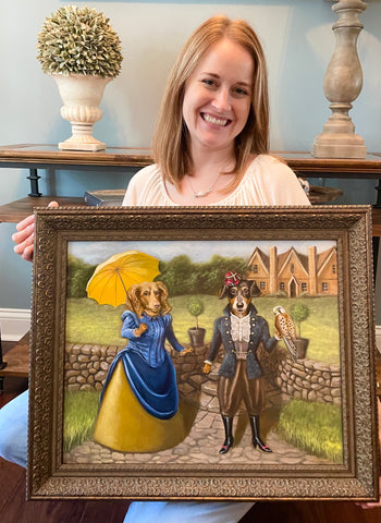 Olivia holding a painting