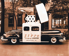 Vintage car in Zippo style in front of the building