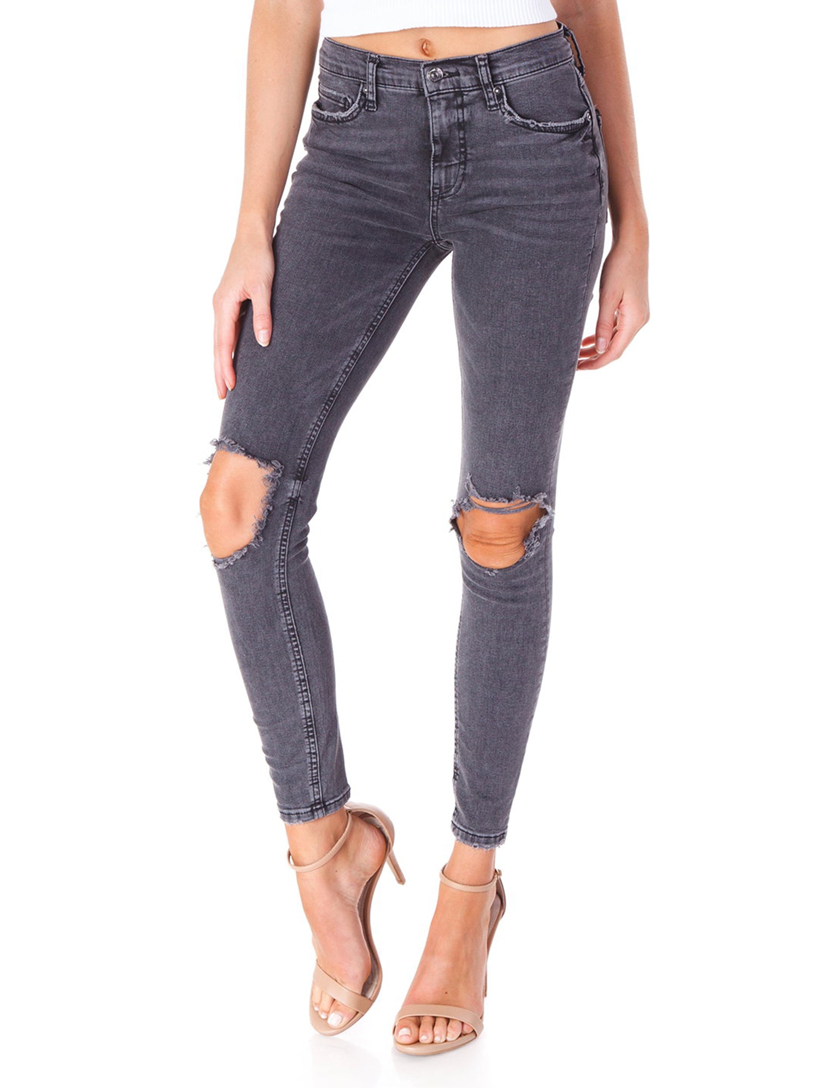 black busted knee skinny jeans