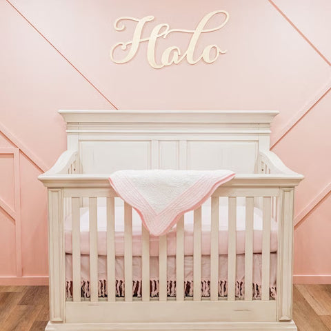 Pink and Gold Nursery Decor with gold baby name sign