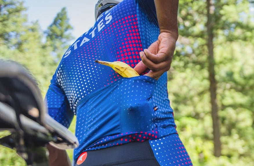 Cyclist with a banana in his jersey pocket