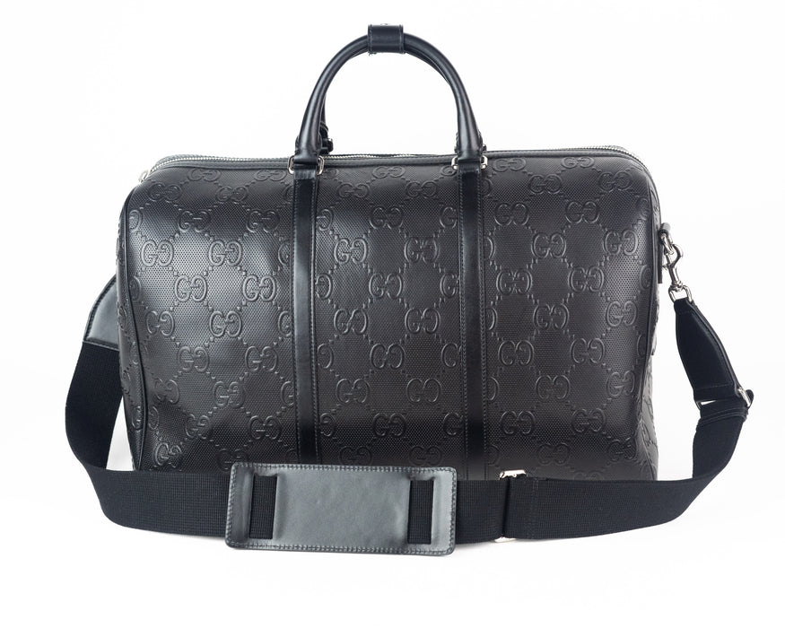 Gucci GG Embossed Duffle Bag in Black Leather — Luxurysnob