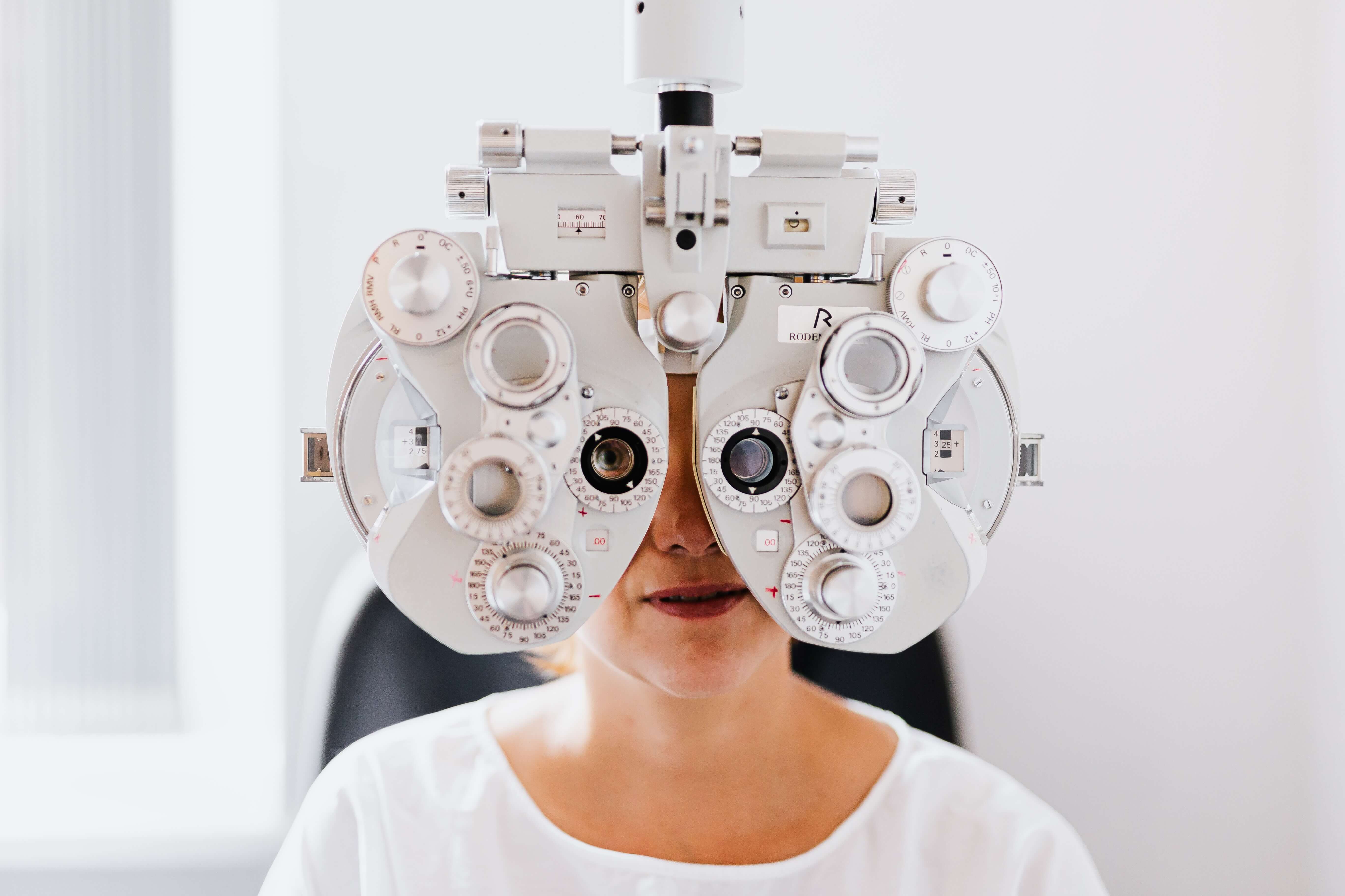 woman getting eyes tested