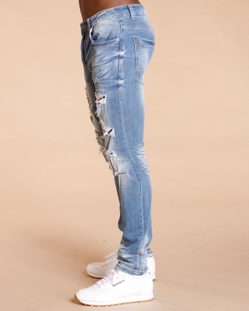 super skinny light blue ripped jeans mens