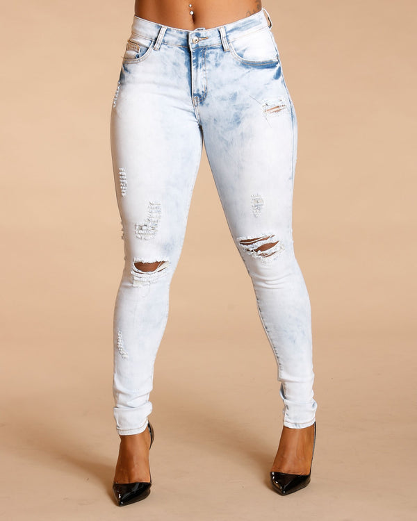 ripped jeans in front and back