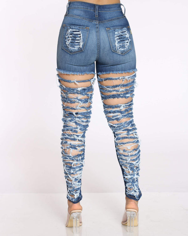 jeans ripped in the front and back