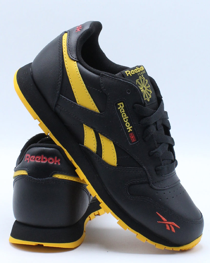 reebok black yellow shoes