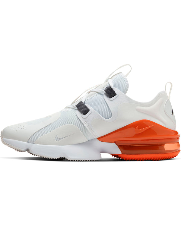 white and orange tennis shoes