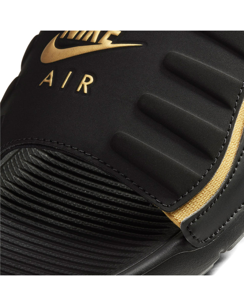 black and gold nike sliders