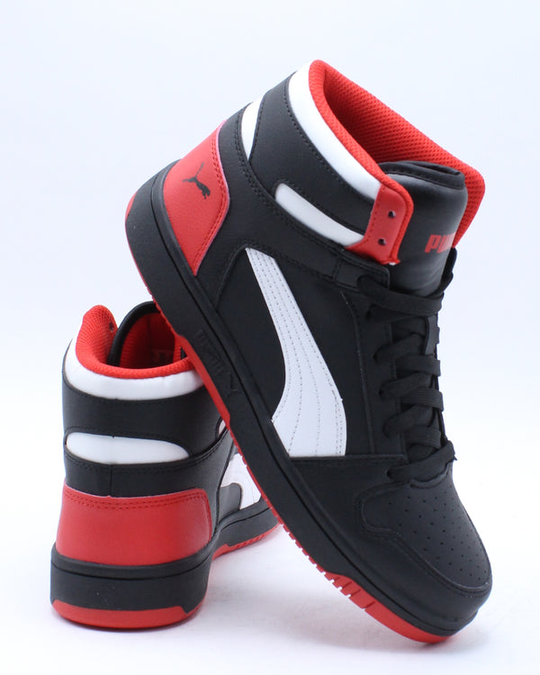 black white and red sneakers