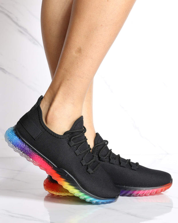 black nike with colorful bottom