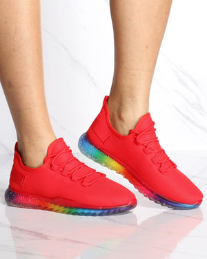 pink nikes with rainbow bottom