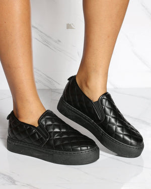 black quilted slip on shoes