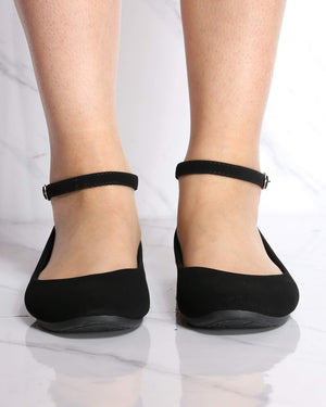black flat with ankle strap