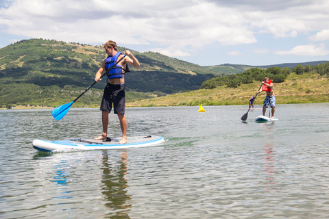 Paddlers round race buoys at the lake, July 2016.