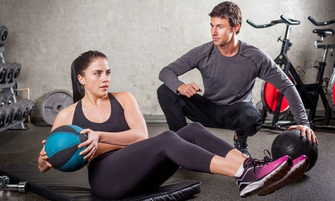 seated medicine ball twist