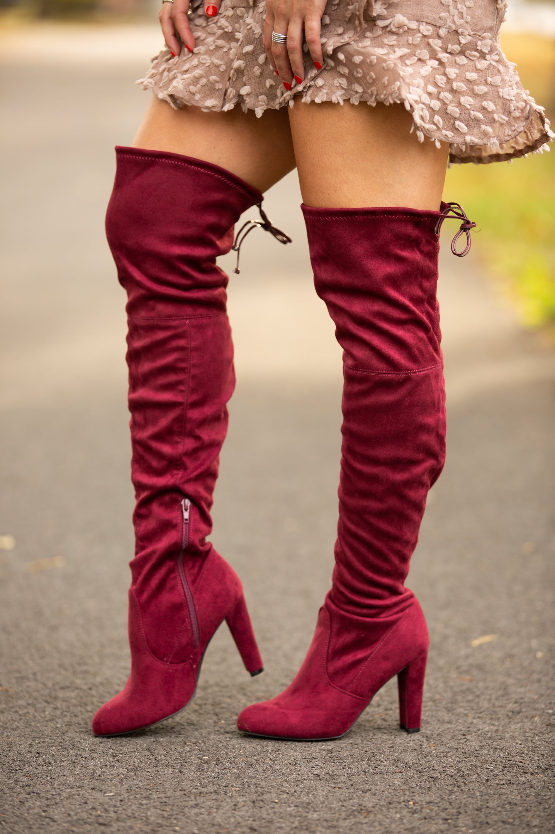 burgundy high knee boots