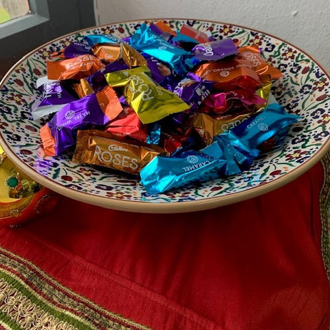 Wildflower Meadow Bowl with sweets lifetyle Nicholas Mosse Pottery