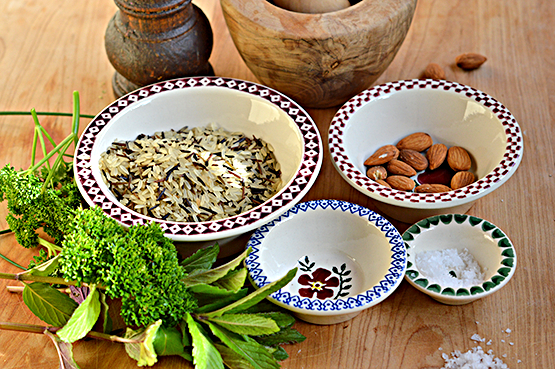 Nicholas Mosse Pottery Chef set bowls on table filled with wild rice, almonds, sea salt