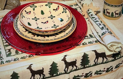 Nicholas Mosse Pottery christmas table setting with winter robin and reindeer pattern