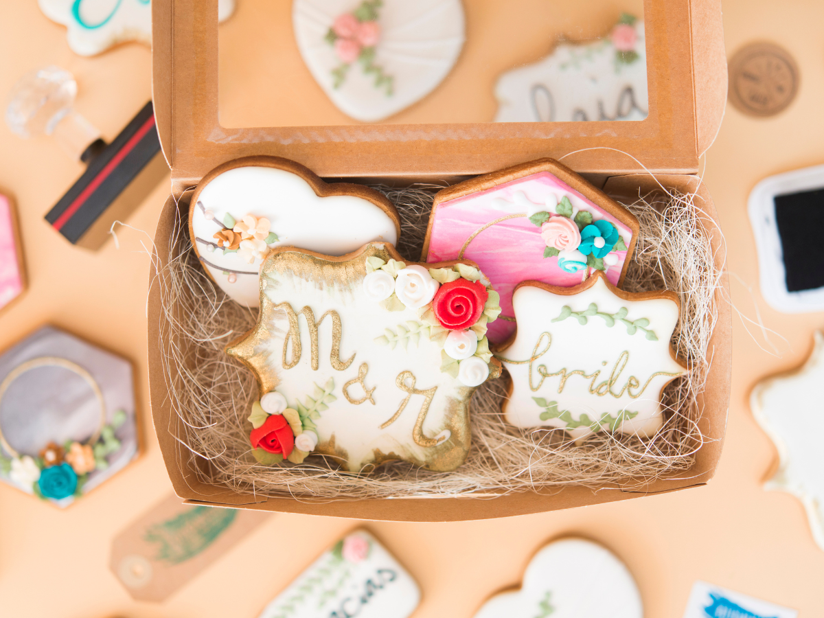 Decorated cookies placed in a gift box