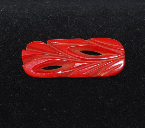 Red Carved Bakelite Pin