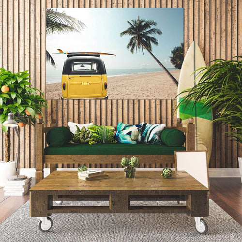 Vintage car with a surfboard on the roof Canvas Print