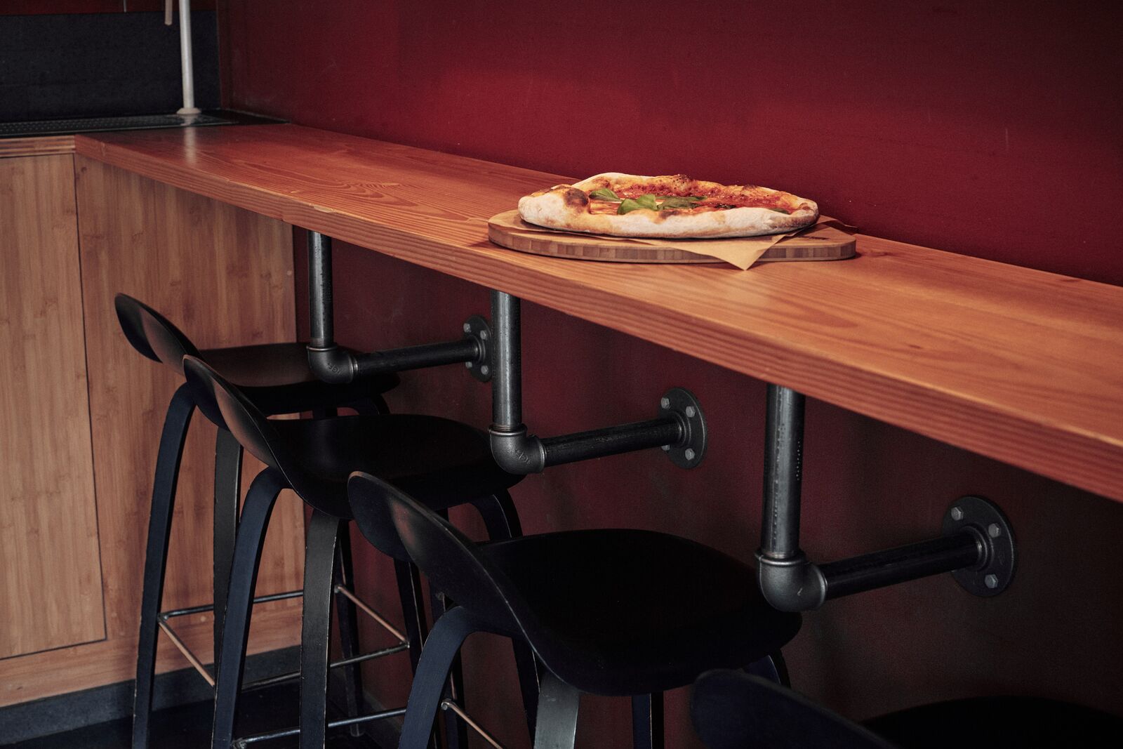 Bar tables attached to the wall - industrial design - iron & wood