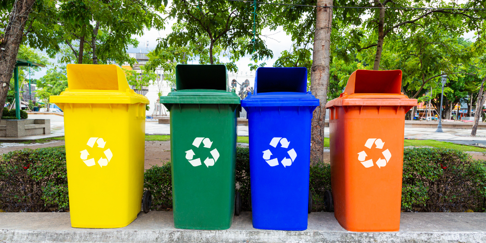 Line of colorful recycling bins. MABLE bio plastic blog post