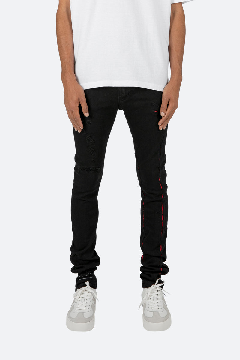 X412 Lava Stretch Denim - Black/Red | mnml | shop now