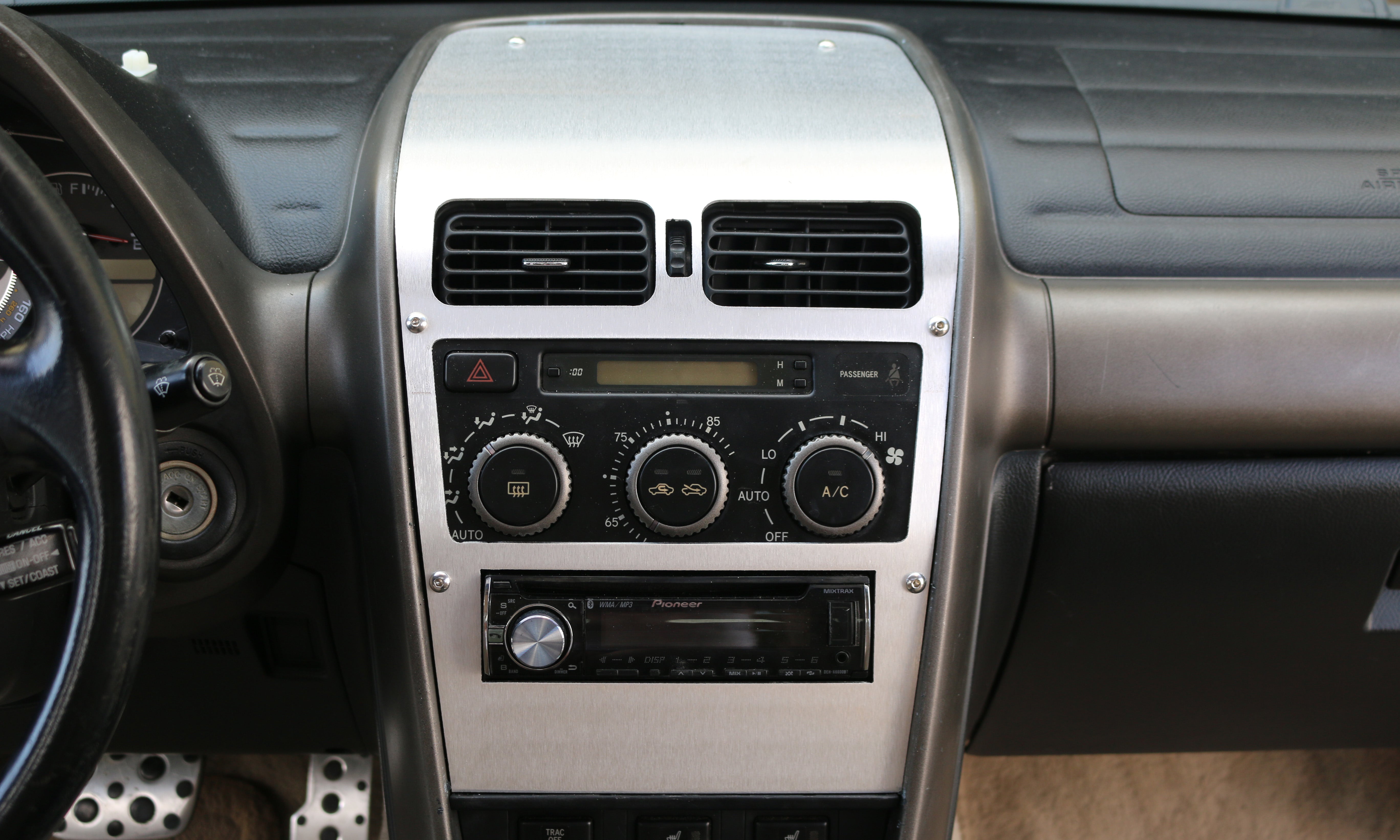 Lexus IS300 (01-05) Aluminum Radio Surround | Spinnywhoosh Graphics