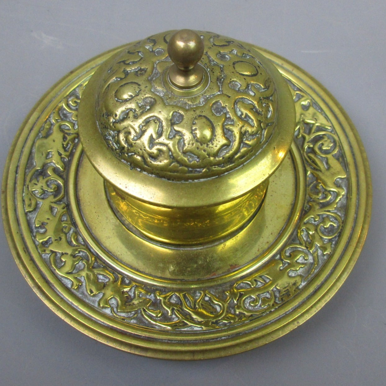 Lot - TWO ORNATE VICTORIAN BRASS INKWELLS, LATE 19TH CENTURY