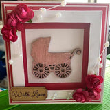 MDF pram shape and glitter paste were used to make this card