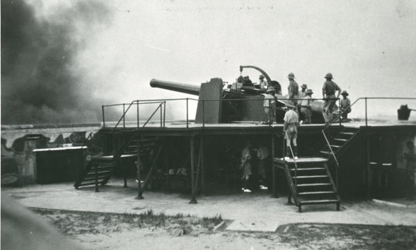 Gunners firing the Mark X 9.2-inch breech loading gun at Fort Serapong, 1930s. Courtesy of Sentosa Development Corporation