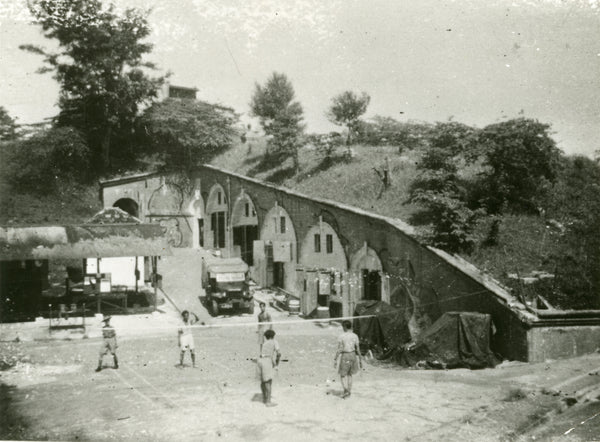 Soldiers playing badminton at Fort Siloso, c. 1940-50s. Courtesy of Sentosa Development Corporation