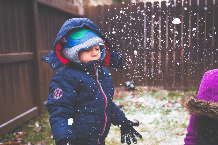 Tips to Keep Your Kids Warm on Your Winter Vacation - Limit layers
