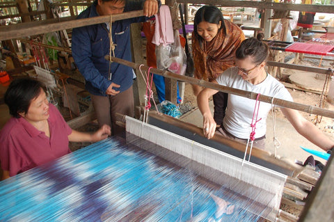 Sapahn founder Brooke Mullen weaving silk with Thai artisans