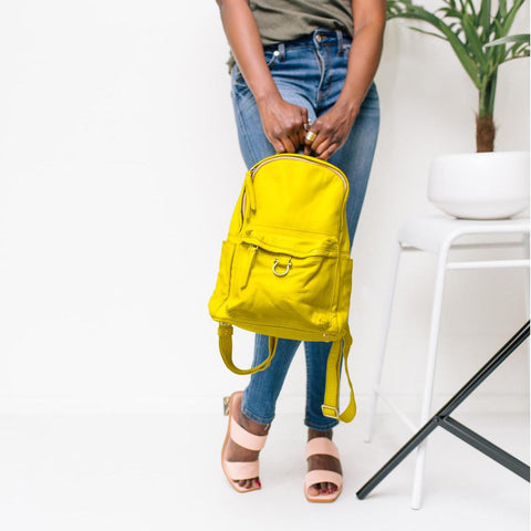 Illuminating yellow makes a great pop of color with a neutral outfit