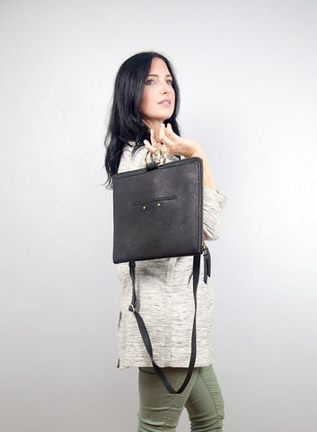 Strong minimalist woman with Sapahn M Crossbody bag