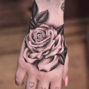 Hand Tattoo by Lachie Grenfell – Vic Market Tattoo