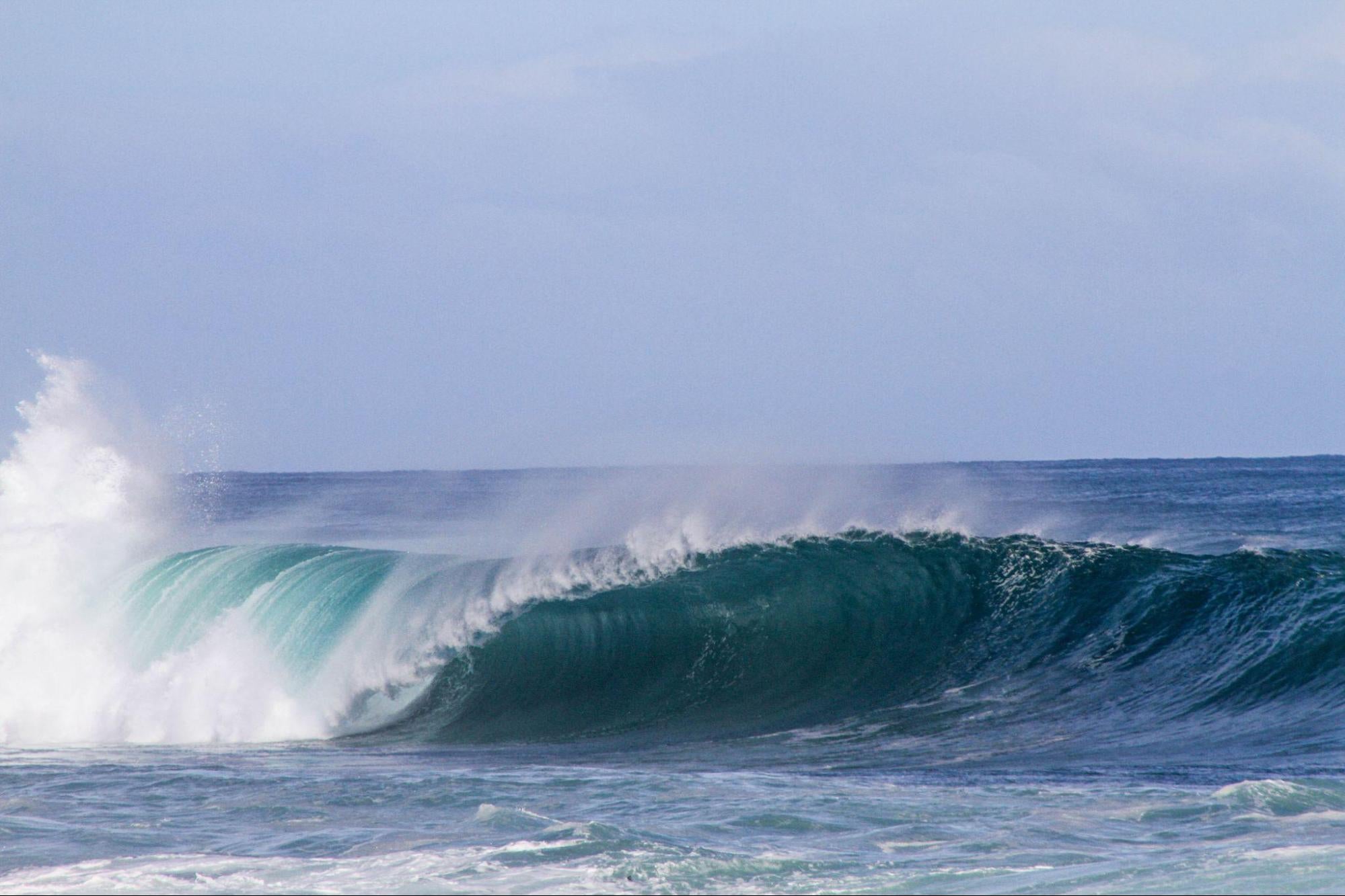 What Makes a Wave “Break?”