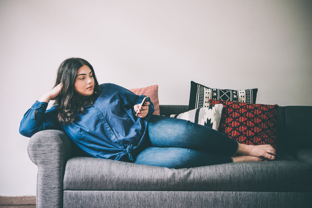 full figure woman on couch