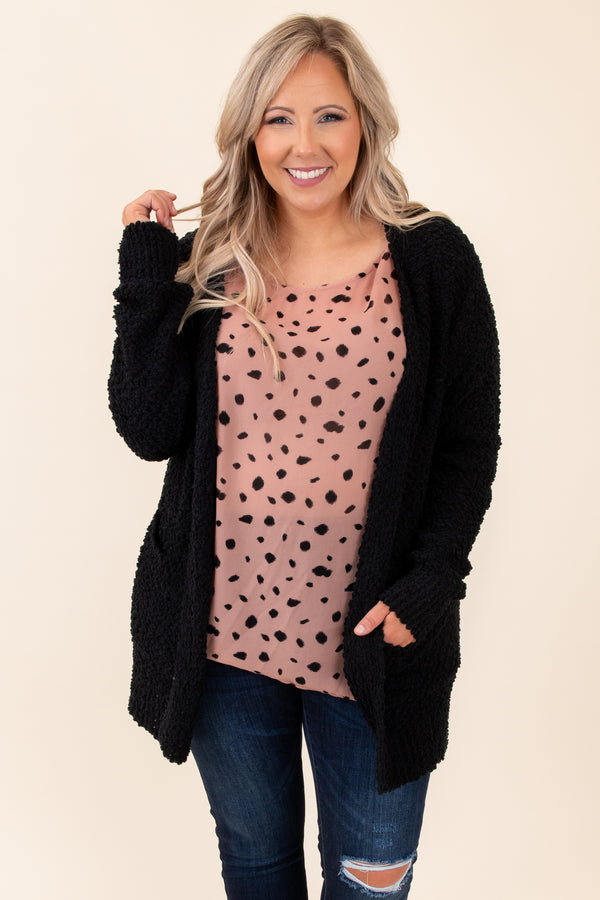 pink top with black polka dots